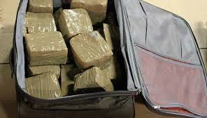 FOUR COPS ARRESTED FOR SMUGGLING COCAINE