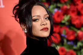 Rihanna poses topless to Popcaan song